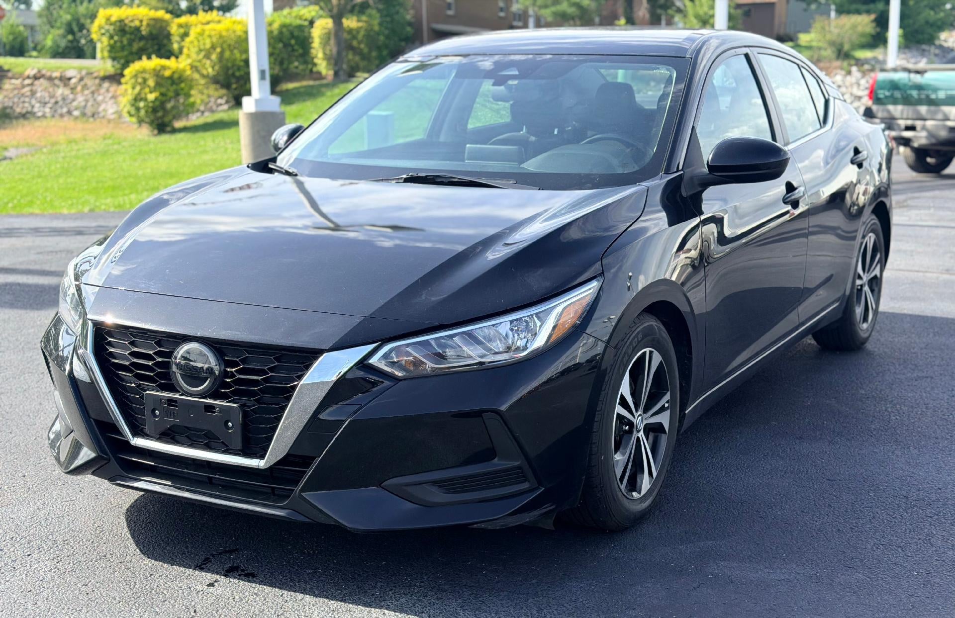 2023 Nissan Sentra SV in Black — front three-quarter view