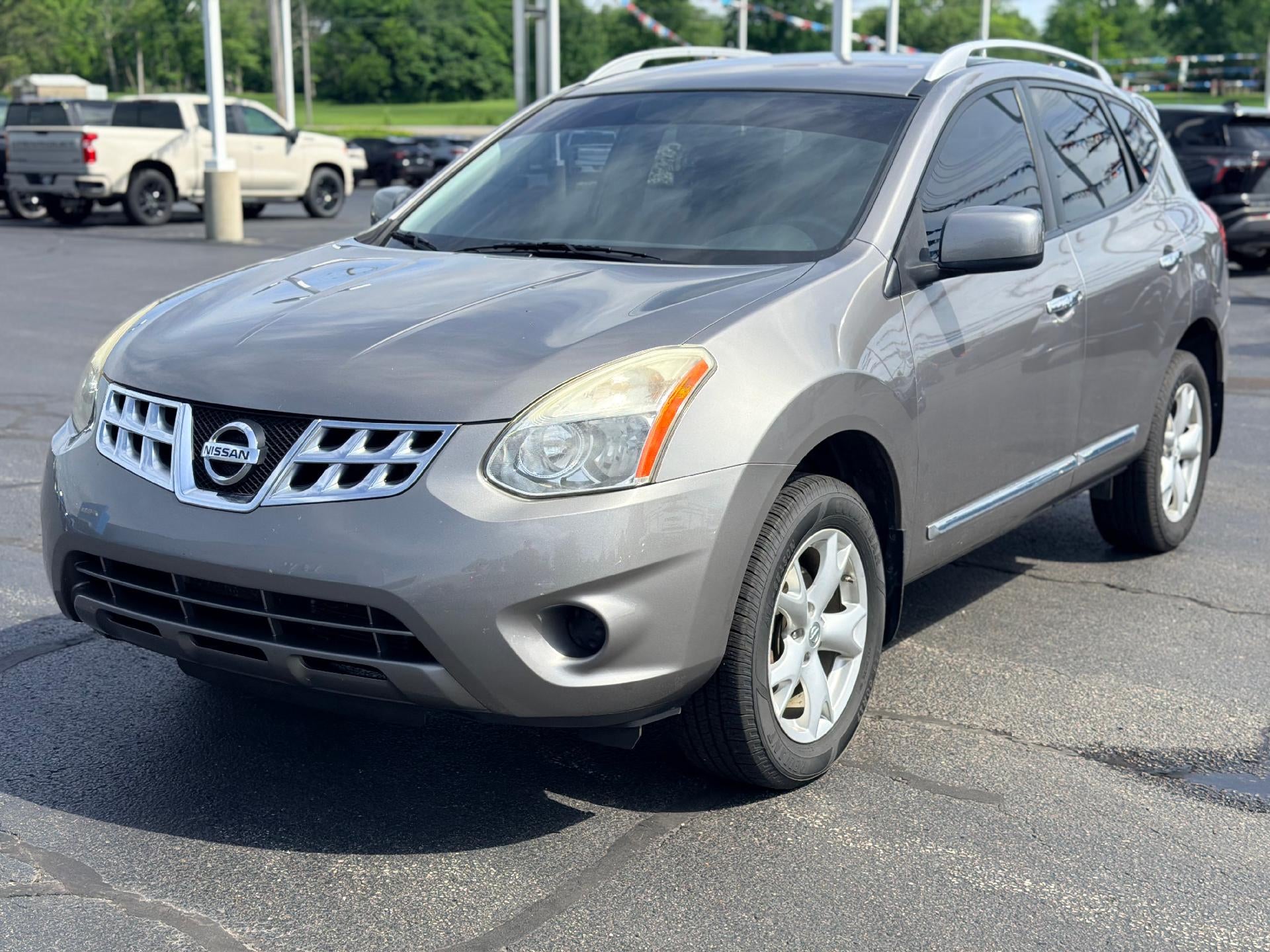 2011 Nissan Rogue SV in Silver — front three-quarter view
