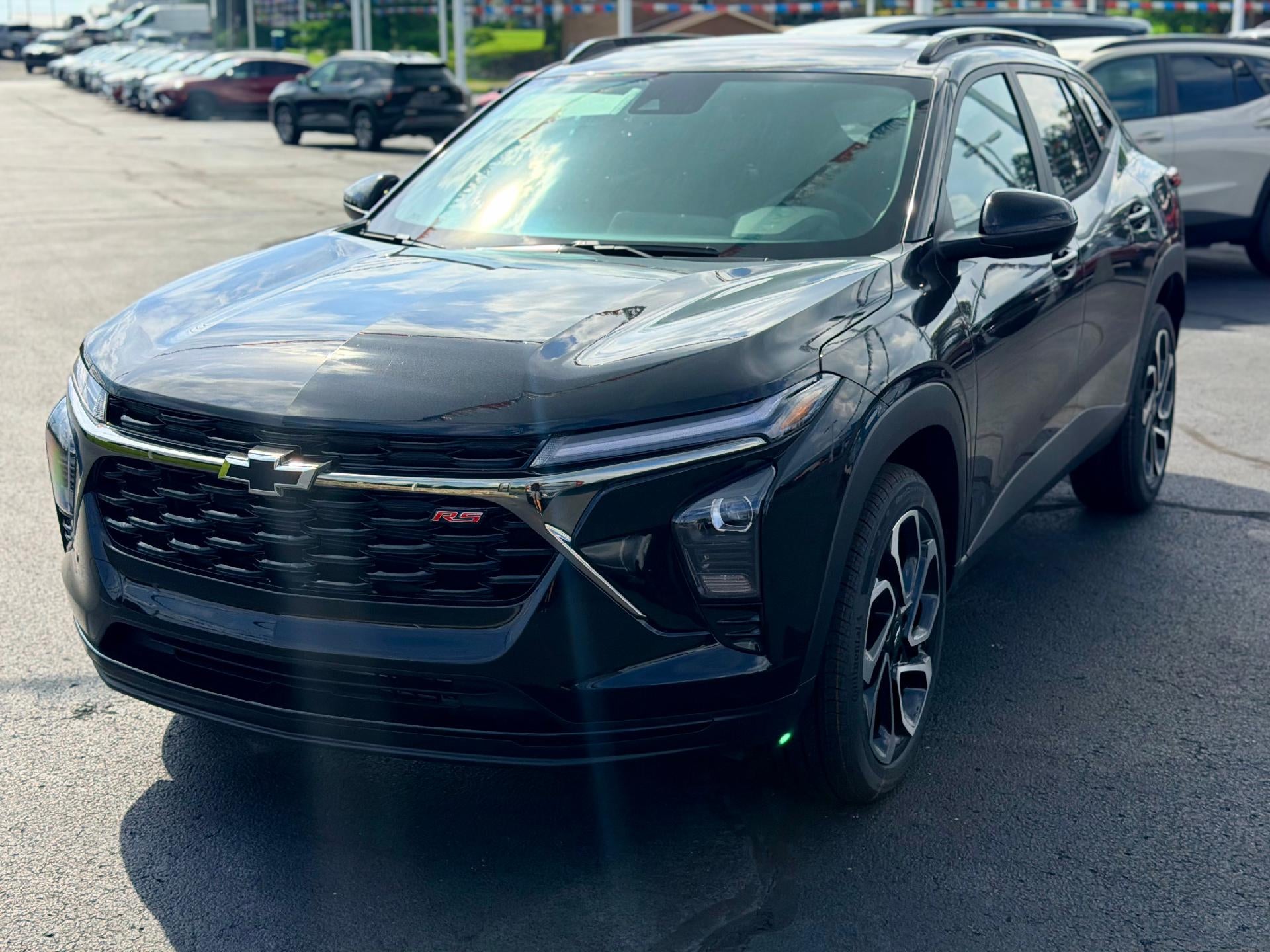 2026 Chevrolet Trax 2RS in Mosaic Black Metallic — front three-quarter view