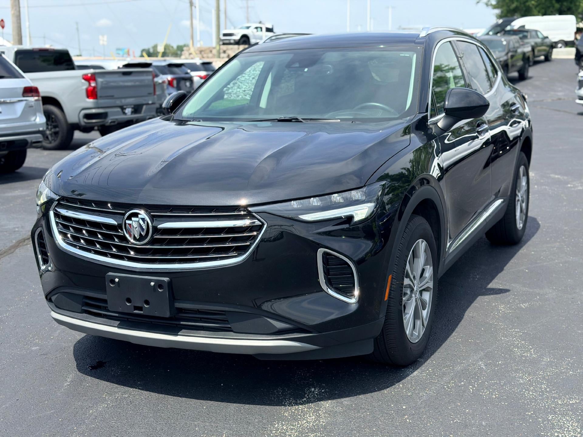 2022 Buick Envision Preferred in Ebony Twilight Metallic — front three-quarter view